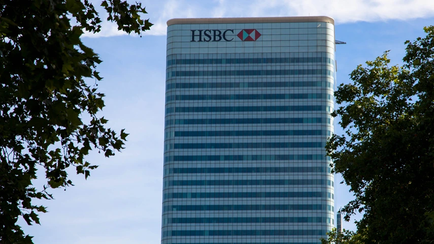 HSBC's best returns in near 20 years meet a $1.3 billion credit charge